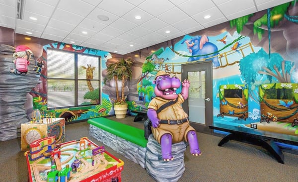 hippo adventurer with jungle murals